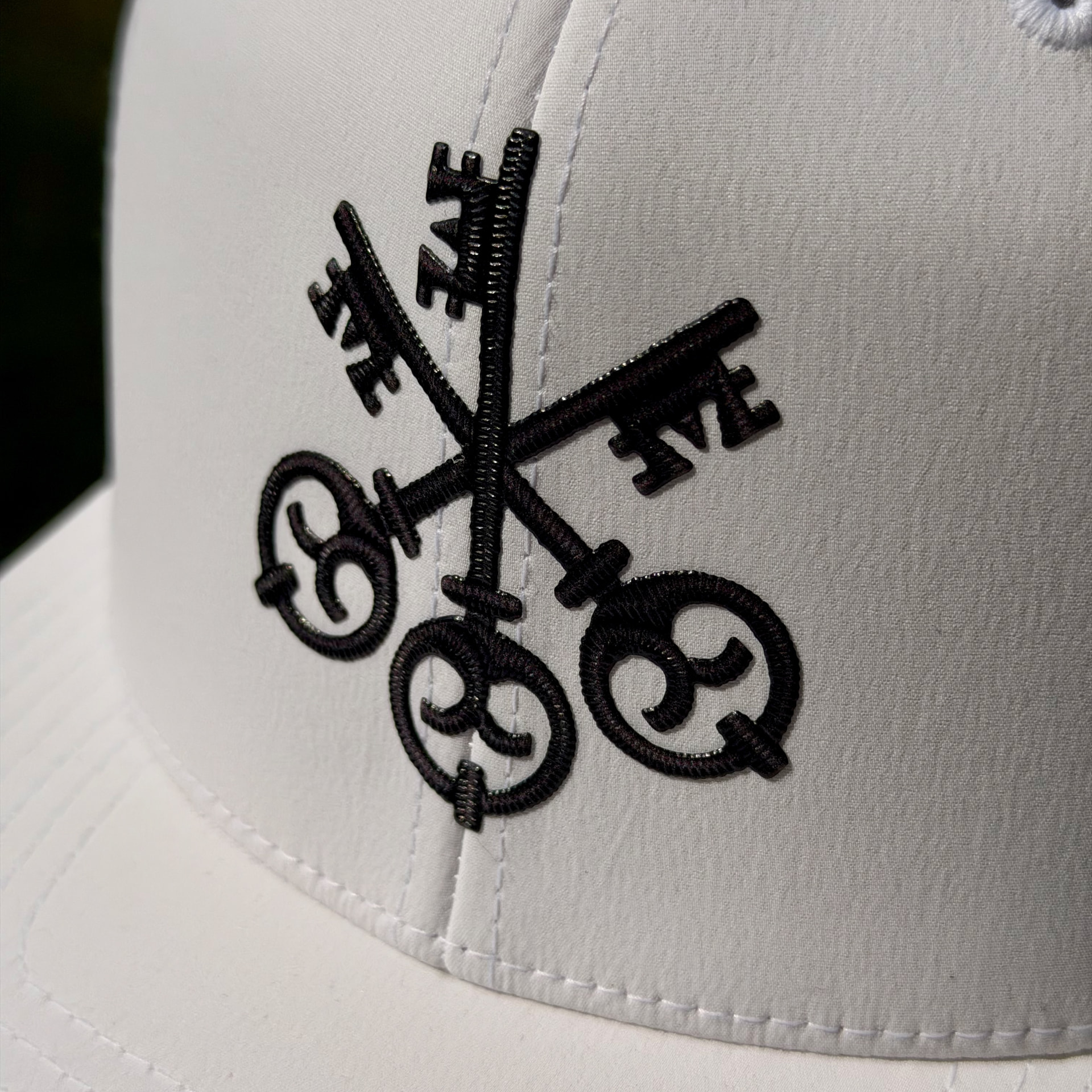 Flexbroidery patch macro photograph on a custom cap