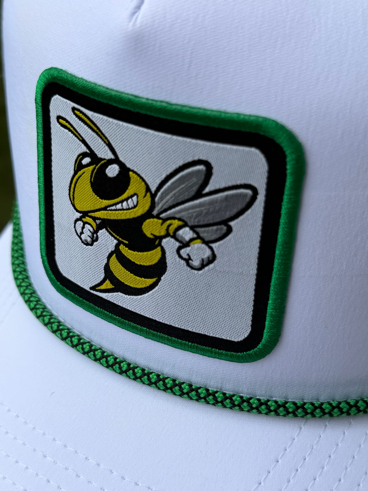 Embroidered & Fabric patch macro photograph on a custom cap
